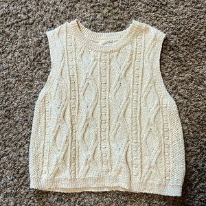 Cream colored sweater vest